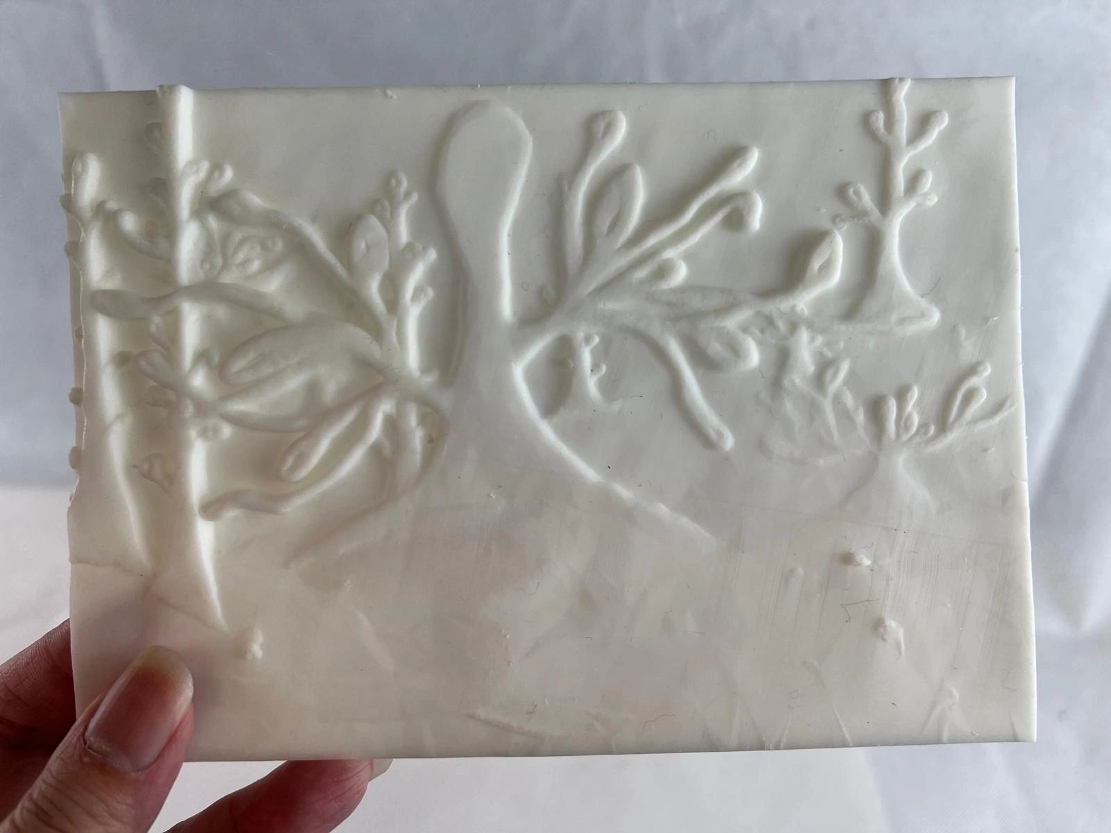 Bas-relief tile with coral and seaweed motifs — ceramic test print